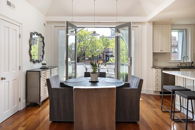 337 Marlborough Unit 3, Boston, MA 02115 - dining area featuring dark wood-style floors and vaulted ceiling
