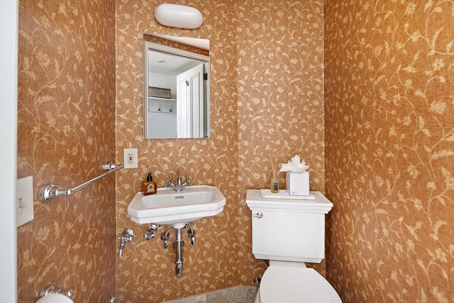 337 Marlborough Unit 3, Boston, MA 02115 - bathroom featuring toilet, a sink, and wallpapered walls