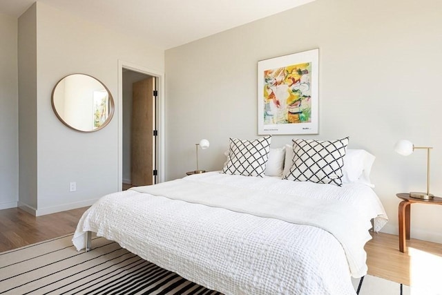 bedroom featuring light wood-type flooring