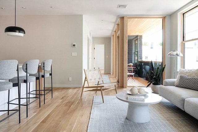 living area with light hardwood / wood-style floors