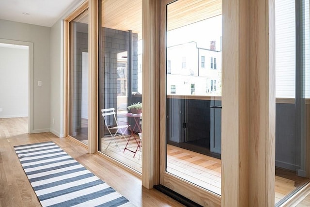 doorway to outside featuring light hardwood / wood-style floors