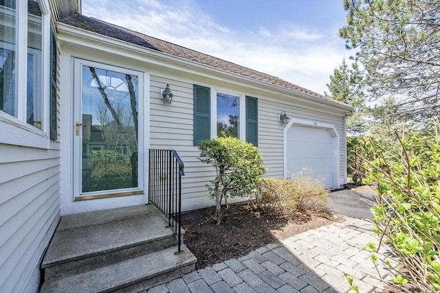 exterior space featuring a garage and driveway