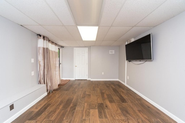 13 Westgate Rd, Framingham, MA 01701 - basement featuring dark wood-type flooring and a paneled ceiling