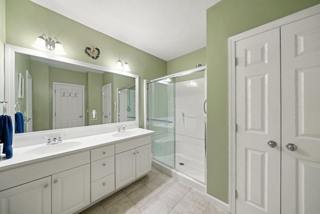 304 Godfrey Dr Unit 304, Norton, MA 02766 - full bath with double vanity, a shower stall, and tile patterned floors