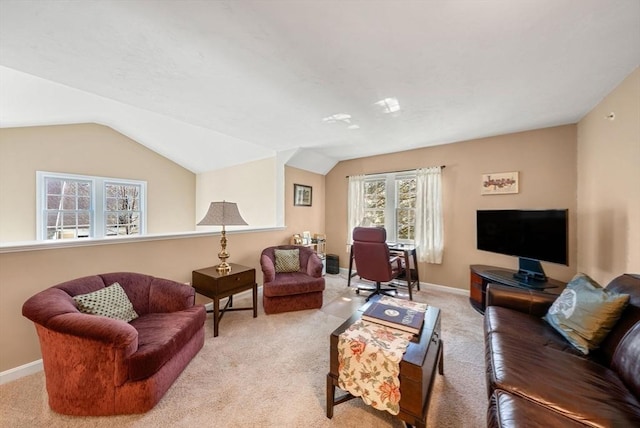 304 Godfrey Dr Unit 304, Norton, MA 02766 - carpeted living room featuring vaulted ceiling and baseboards