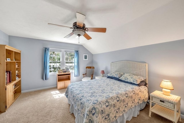 304 Godfrey Dr Unit 304, Norton, MA 02766 - bedroom with baseboards, light carpet, vaulted ceiling, and ceiling fan
