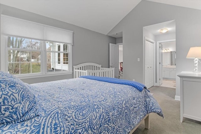 4 Rose Court Way Unit 4, Walpole, MA 02032 - bedroom with vaulted ceiling, light colored carpet, ensuite bath, a closet, and baseboards