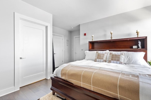 bedroom featuring hardwood / wood-style flooring