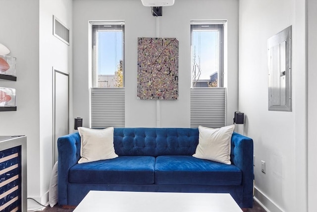 interior space featuring electric panel and wine cooler