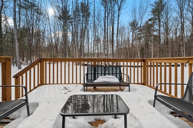 view of snow covered deck