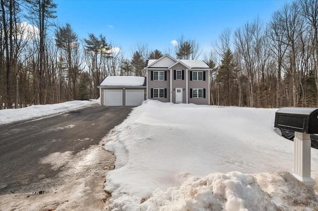 view of front of house with a garage and driveway