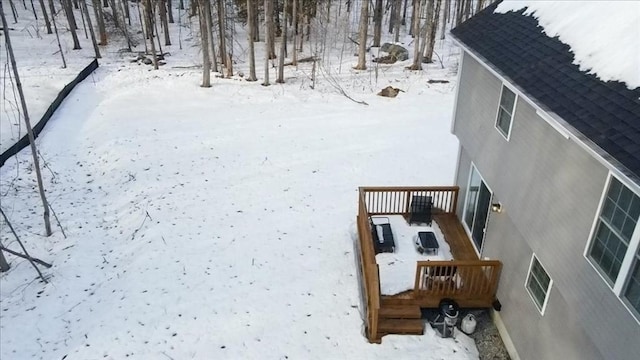 view of yard layered in snow