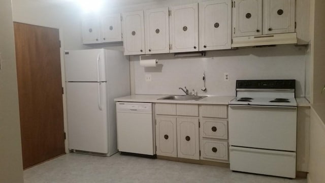 924 Main St Unit 23, Woburn, MA 01801 - kitchen featuring white appliances, under cabinet range hood, a sink, light countertops, and light flooring