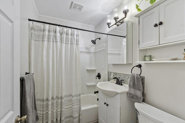 bathroom featuring visible vents, vanity, shower / bath combination with curtain, toilet, and backsplash