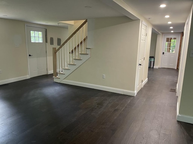 11 Pleasant St, Freetown, MA 02702 - entrance foyer with dark wood finished floors, stairway, plenty of natural light, and recessed lighting
