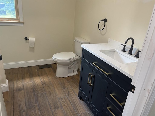 11 Pleasant St, Freetown, MA 02702 - half bath with vanity and wood finished floors