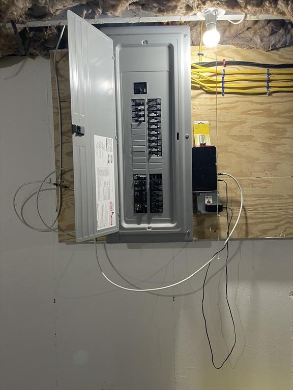 11 Pleasant St, Freetown, MA 02702 - utility room featuring electric panel