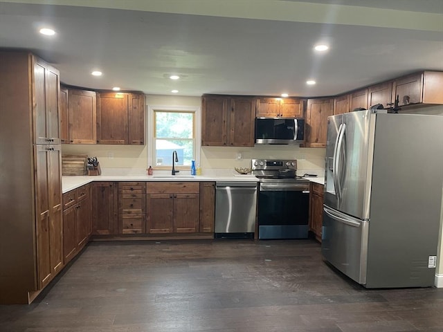 11 Pleasant St, Freetown, MA 02702 - kitchen featuring stainless steel appliances, dark wood-type flooring, light countertops, and recessed lighting