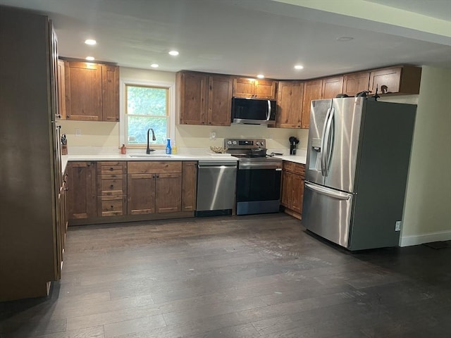11 Pleasant St, Freetown, MA 02702 - kitchen with stainless steel appliances, dark wood-style floors, recessed lighting, and light countertops