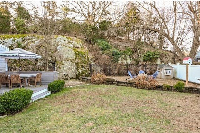 view of yard featuring a wooden deck