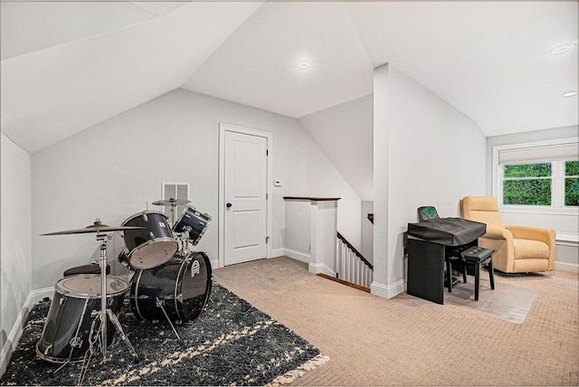 additional living space with carpet floors, visible vents, baseboards, vaulted ceiling, and recessed lighting