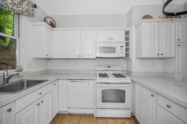 3 Chipmunk Trl Unit 3, Westford, MA 01886 - kitchen featuring white appliances, a sink, white cabinetry, and light countertops