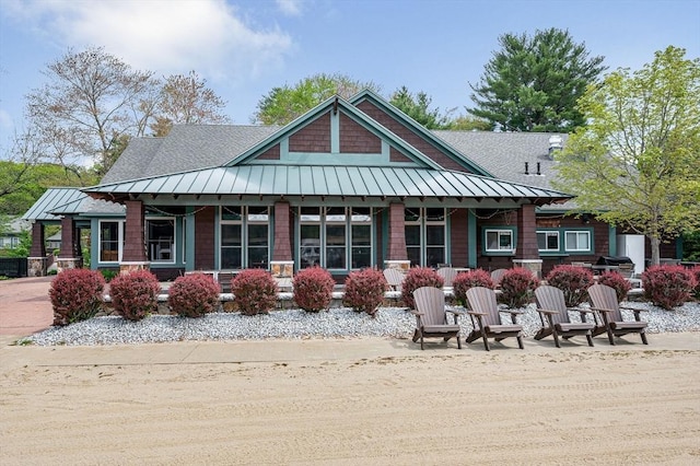 3 Chipmunk Trl Unit 3, Westford, MA 01886 - rear view of house featuring a standing seam roof, metal roof, and a shingled roof