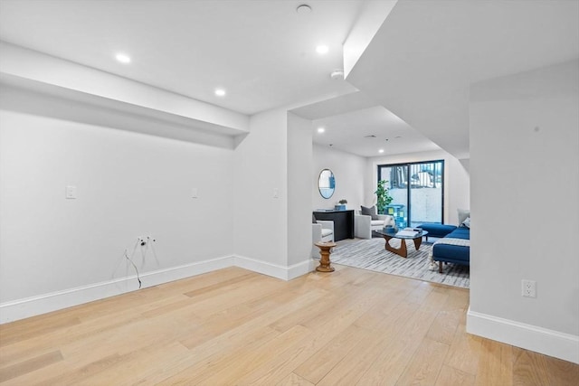 interior space with recessed lighting, light wood-style floors, and baseboards