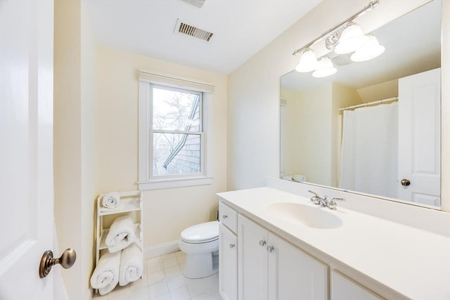 full bath with baseboards, visible vents, toilet, tile patterned flooring, and vanity