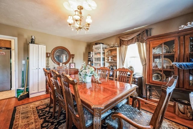 375 Winchendon Rd, Ashburnham, MA 01430 - dining area featuring a chandelier and wood finished floors