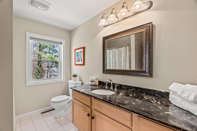 full bath with vanity, toilet, tile patterned floors, baseboards, and visible vents