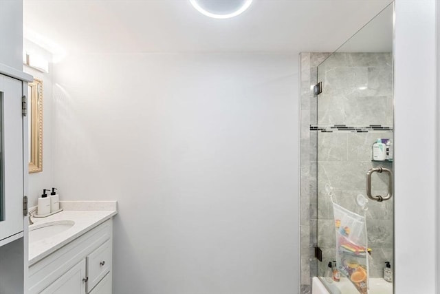 full bath featuring a stall shower and vanity