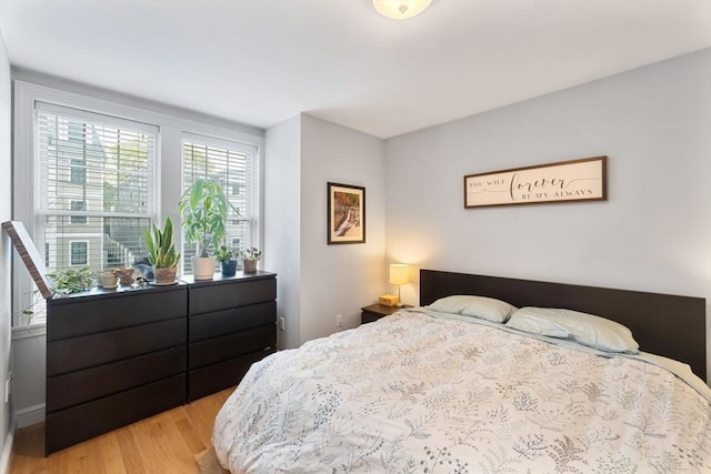 bedroom featuring light wood-type flooring