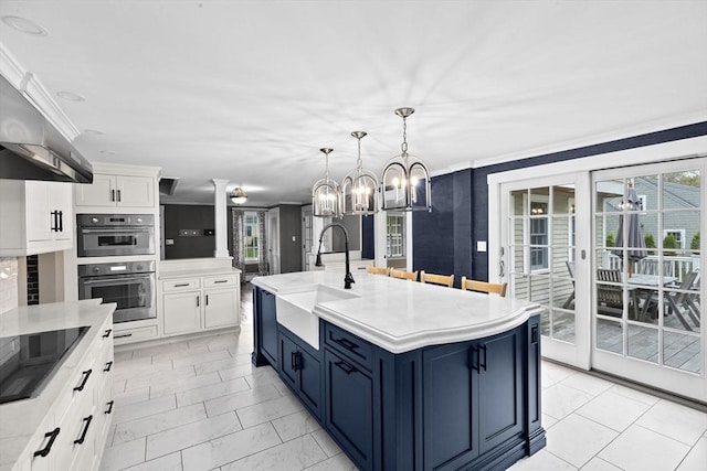 5 Liberty Rd, Hingham, MA 02043 - kitchen with a chandelier, light countertops, white cabinetry, and crown molding