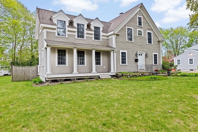 5 Liberty Rd, Hingham, MA 02043 - view of front facade with covered porch, a front lawn, and a shingled roof