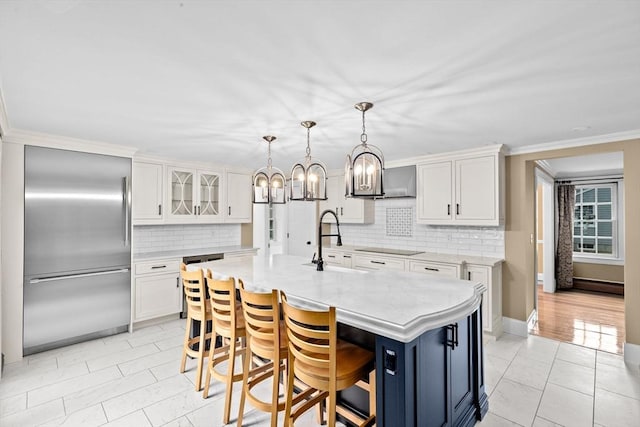 5 Liberty Rd, Hingham, MA 02043 - kitchen featuring stainless steel built in refrigerator, white cabinets, decorative backsplash, a chandelier, and crown molding