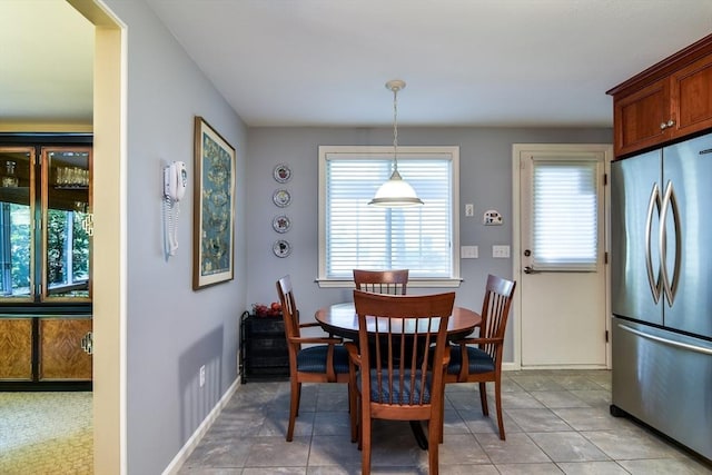 38 Stagecoach Dr, Ashland, MA 01721 - dining room featuring baseboards and light tile patterned flooring