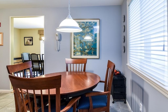 38 Stagecoach Dr, Ashland, MA 01721 - dining area featuring healthy amount of natural light, baseboards, and light tile patterned floors