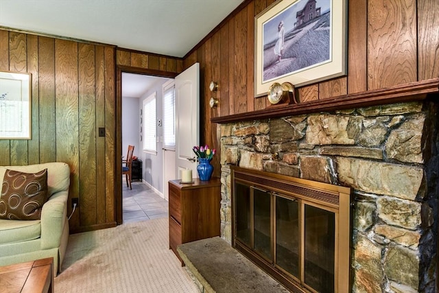38 Stagecoach Dr, Ashland, MA 01721 - living room featuring wooden walls, a fireplace, and light carpet