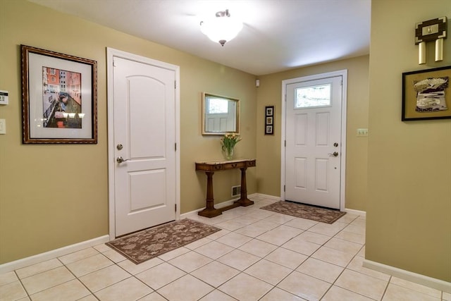 38 Stagecoach Dr, Ashland, MA 01721 - foyer featuring light tile patterned floors and baseboards