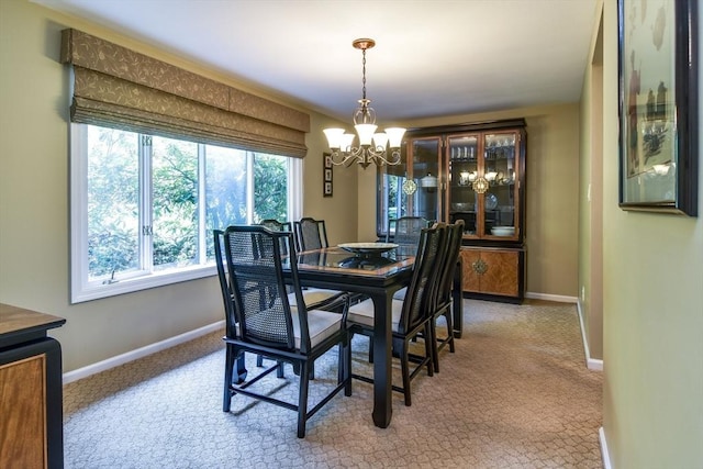 38 Stagecoach Dr, Ashland, MA 01721 - dining space with a chandelier, carpet flooring, and baseboards