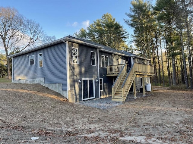 rear view of house with a deck