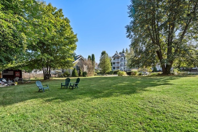 view of community with a lawn