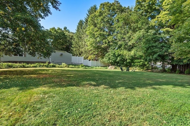 view of yard featuring fence