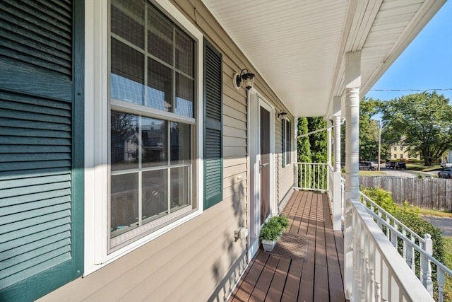 wooden terrace with a porch