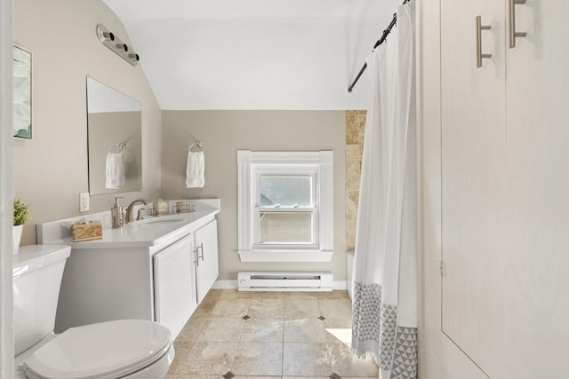 bathroom featuring vaulted ceiling, toilet, vanity, and a baseboard radiator