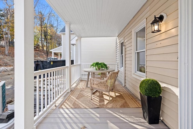 balcony featuring a porch