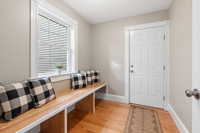 mudroom with light hardwood / wood-style floors