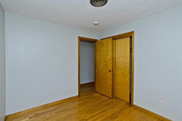 13 Louise Ave, Chicopee, MA 01013 - unfurnished bedroom featuring a closet and light wood-style flooring