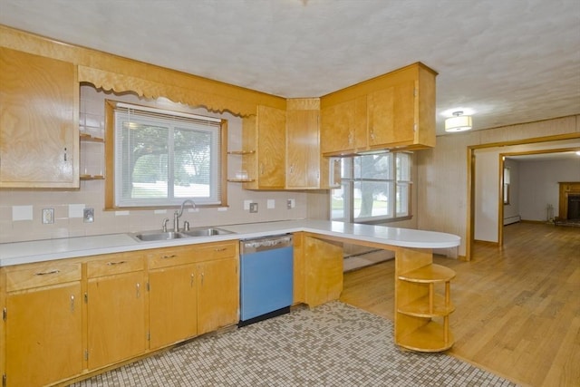 13 Louise Ave, Chicopee, MA 01013 - kitchen with dishwashing machine, open shelves, a peninsula, light countertops, and light wood-style flooring